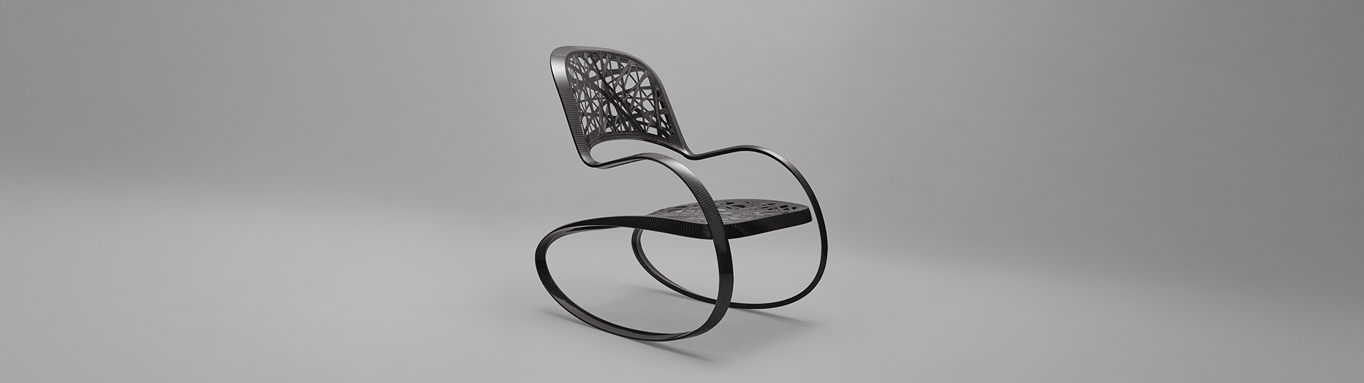 Rocking-chair Signature, une sculpture noire aux lignes organiques